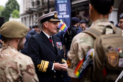 Officer from the Army greets cadets during Pride in London