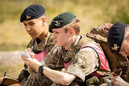Cadets write notes during Champion Cadet lesson