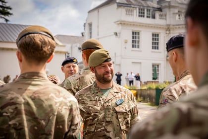 Senior Officer speaks with cadets during the Champion Cadet Competition parade