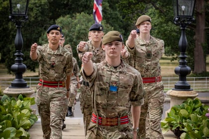 Cadets march into the Frimley CTC building