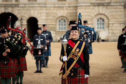Cadet smiles while performing at Military Music Spectacular 2025