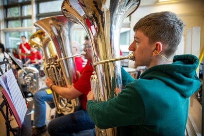 Cadet playing instrument at rehearsals