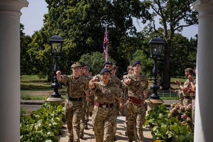 Cadets march into the front of the Frimley Park house