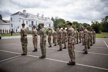 Cadets stand to attention with Frimley Park CTC in the background