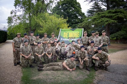 Cadets from the Master Cadet course pose with the Army Cadet deck chair