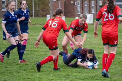 Female cadets playing rugby