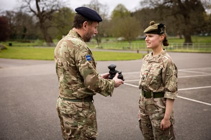 CO of Frimley Park Cadet Training Centre presents an award to top student