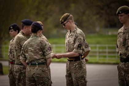Cadet receives his Master Cadet Course badge