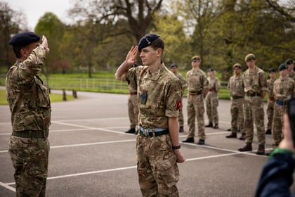 Cadet salutes the CO of Cadet Training Centre Frimley Park