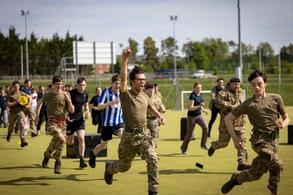 Cadets running across the sports field
