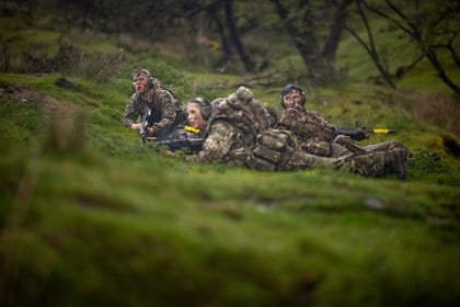 Cadets lie on the ground during fieldcraft exercise at Cadet Cambrian Patrol 2026