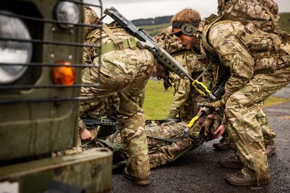 Cadets attend to casualty at first aid exercise