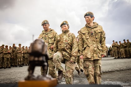 Three cadets marching during presentation of Cambrian Patrol