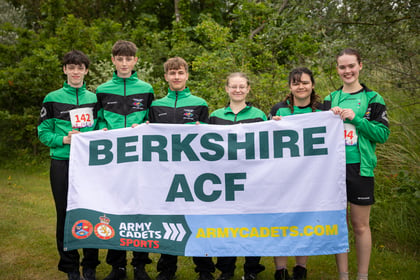 Cadets from Berkshire ACF stand with their team banner at Rivalry Cup