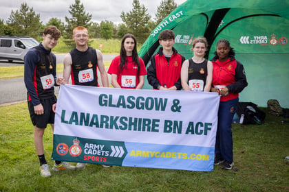 Cadets from Scotland hold up their team banner at Rivalry Sports Cup