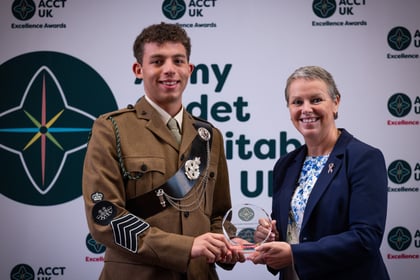 Sally Orange presents an award to a cadet