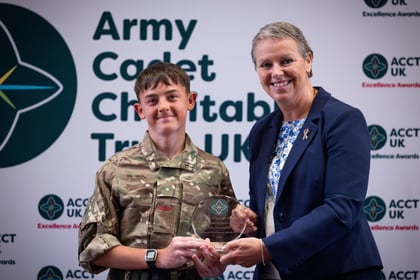 Sally Orange presents an award to a cadet