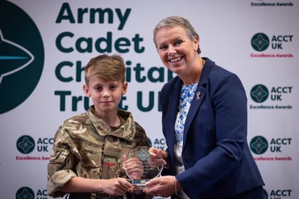 Young male cadet receives his ACCT UK Award from Sally Orange