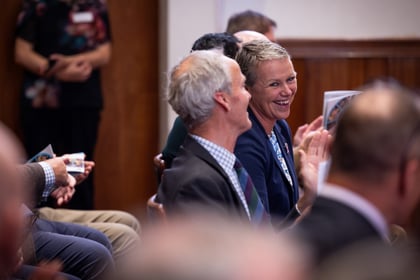 Sally Orange laughing with a man with grey hair