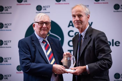 Two elderly men with grey hair