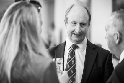 Grayscale image of CEO of ACCT UK awards