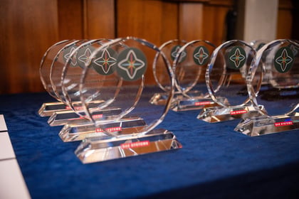 ACCT UK Excellence Awards produced from glass with text on them