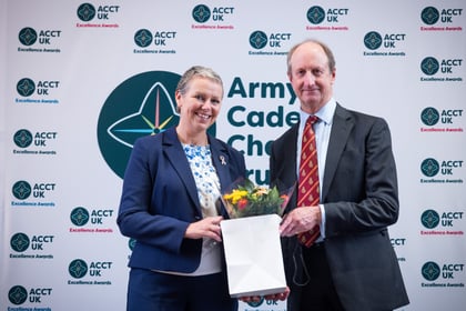Sally Orange receives flowers from the CEO of ACCT UK