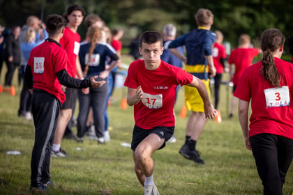 Male cadet wearing red running