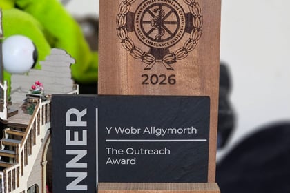 An award plaque featuring the Welsh Ambulance Services logo, the year 2026, the text WINNER, Y Wobr Allgymorth, The Outreach Award, and the recipient's name, Dawn-Louise Jones.