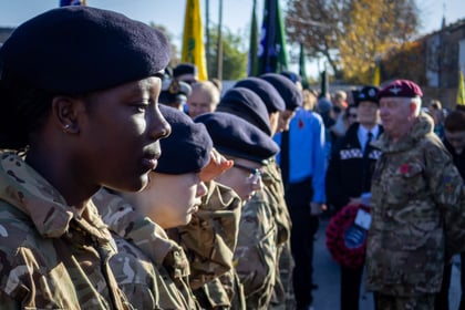 Cadets stand on parade in MTP uniform and berets.