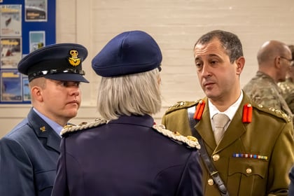 Lord Lieutenant of Essex in uniform talking to RAFAC and ACF Adults. All wearing formal uniform.