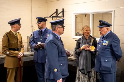 RAFAC and ACF Adults stand talking in uniform.