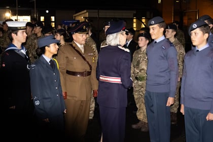 Lord Lieutenant inspecting Army and Air Cadets on parade at night