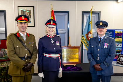 Lord Lieutenant standing next to her plaque with the Commandant of Essex ACF and the Wing Commander of Essex RAFAC