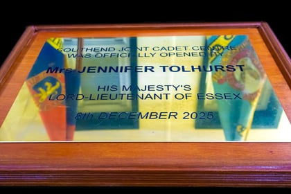 Plague with banner flags of Army and Air Cadets reflecting in the gold. Plague reads: Southend Joint Cadet Centre was officially opened by Mrs. Jennifer Tolhurst His Majesty's Lord-Lieutenant of Essex 8th December 2025