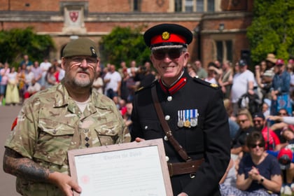 Commissioning Scroll award to Lt Loveridge