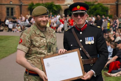 WO2 Cleverley receives the Cadet Force Warrant