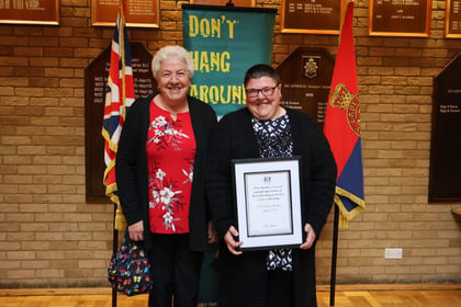 One of the award recipients with their family member