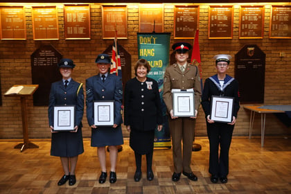 The four Lord Lieutenant Cadets line up either side of the Lord Lieutenant of Suffolk