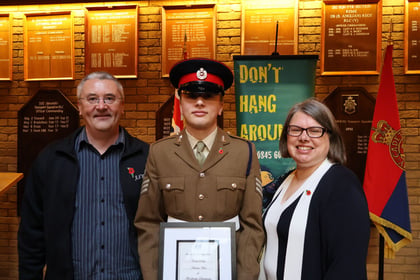 The Lord Lieutenant Cadet and his family pose with his award