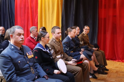 One of the Adult volunteers and the Cadet award recipients lined up waiting for the presentation