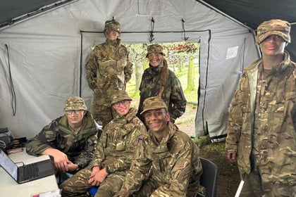Cadets in a tent command center