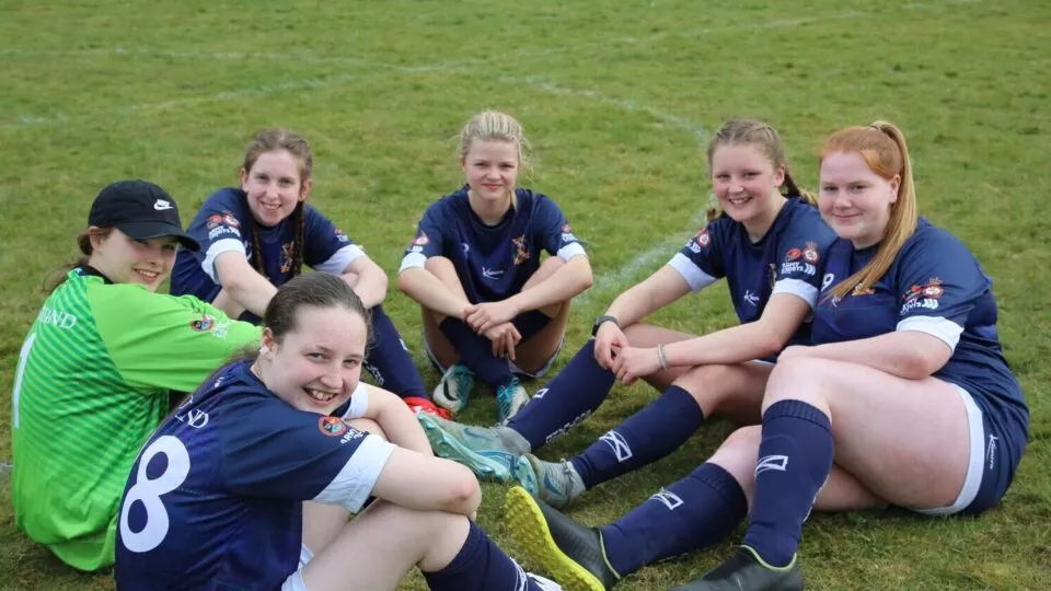 Female cadet football players.