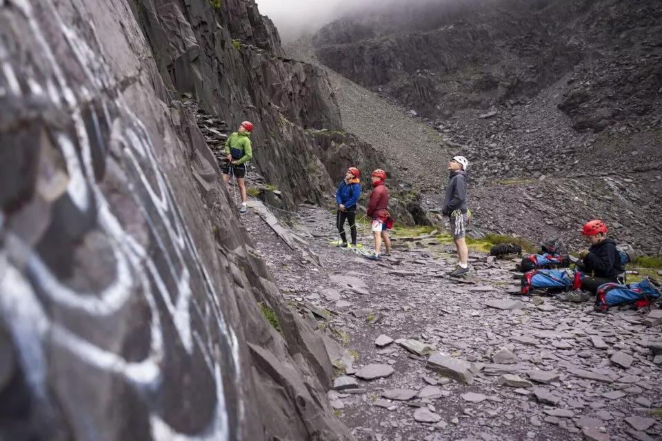 Cadets and adults doing rock climbing