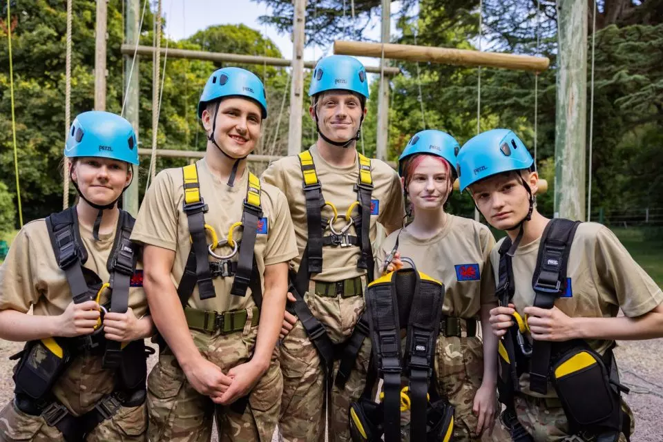 Cadets at annual camp wearing blue helmets