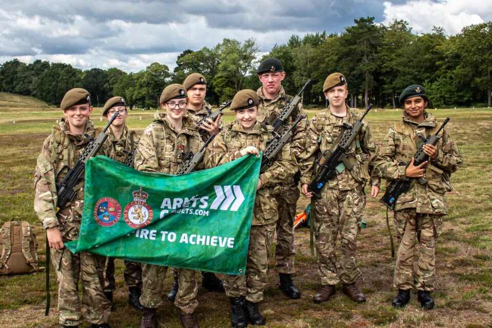 Cadets from Bedfordshire ACF carrying Army Cadets flag