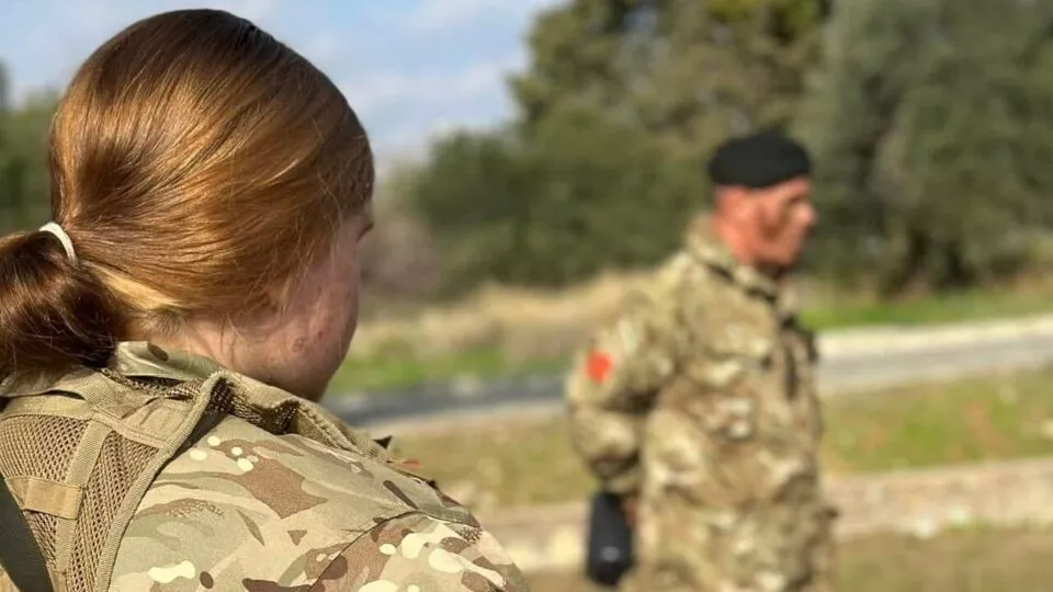 Back view of a female cadet in uniform