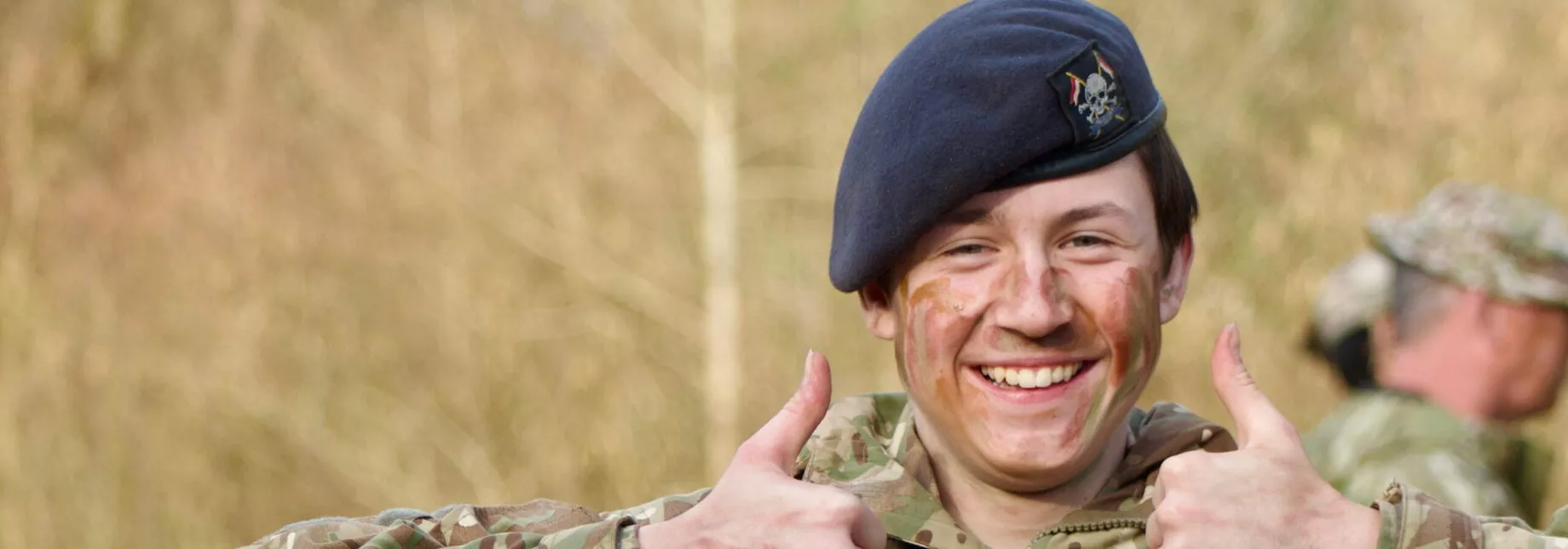 Army Cadet smiling with thumbs up